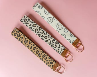Wild & Happy Fabric Keychain Wristlet | Leopard Print, Smiley Face Key Fob
