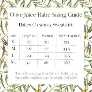 May include: Unisex crewneck sweatshirt sizing guide with measurements in inches for sizes S, M, L, and XL. The guide includes length, width, and sleeve length.