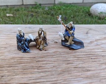 4"L x 2"H Two Men Sitting On Seesaw Mudmen Bonsai Figurine 4"L x 2"H Two Men Sitting On Seesaw Mudmen Bonsai Figurine
