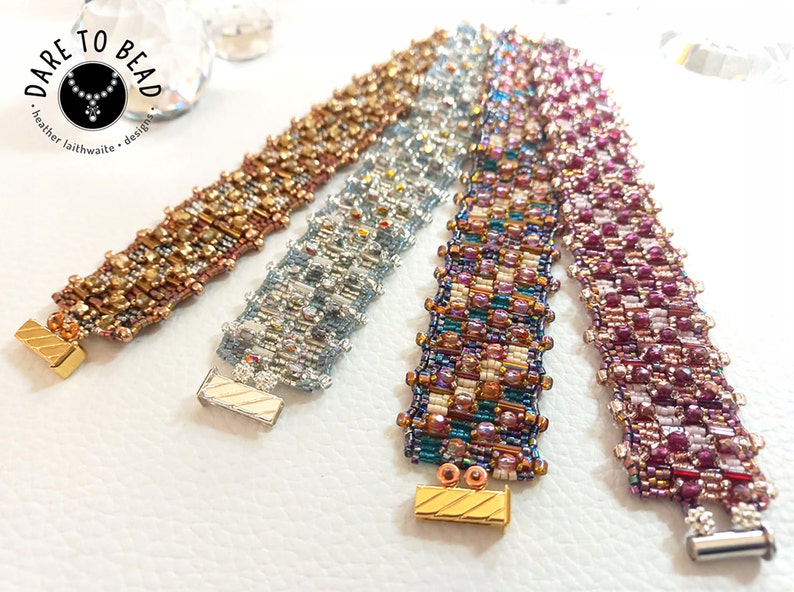 May include: Four beaded bracelets in different color combinations, including gold, silver, teal, and pink. Each bracelet has a unique pattern and is finished with a clasp.