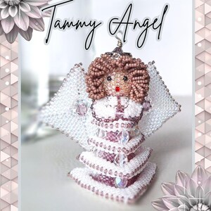 May include: A beaded angel figurine titled Tammy Angel, featuring a head of brown seed beads, a red bead mouth, and white beaded wings. The body is constructed from layered white and mauve seed beads with clear crystal accents throughout.