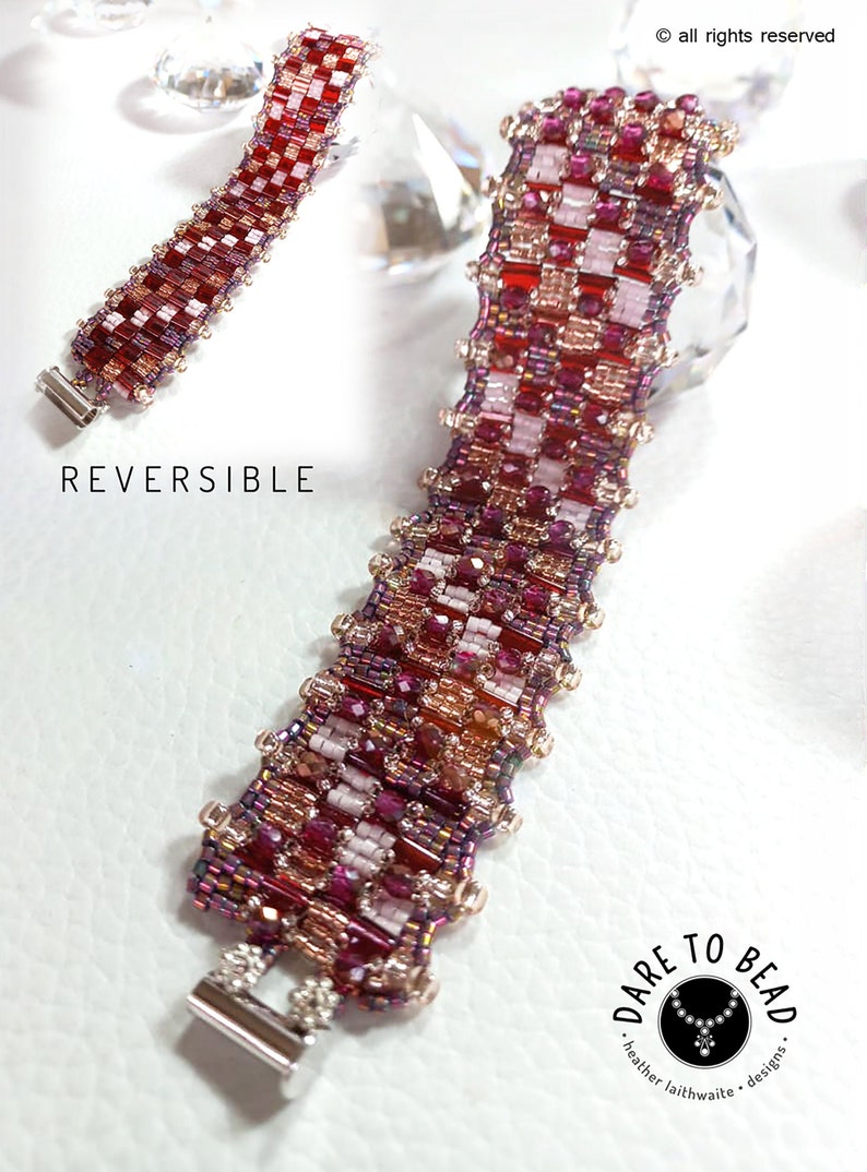 May include: A reversible beaded bracelet with a checkered pattern in shades of red, pink, and white. The bracelet is made with small glass beads and has silver-toned clasps. The text "REVERSIBLE" is visible in the image. The text "DARE TO BEAD" is also visible in the image, along with the text "heather laithwaite - designs."