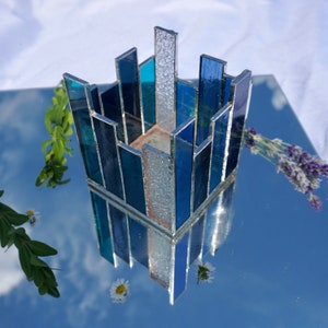 Glass tea light holder