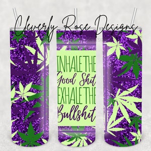 May include: A stainless steel tumbler with a purple glitter background and green and purple cannabis leaves. The tumbler has the text "INHALE THE Good Shit EXHALE THE Bullshit" in green and white.