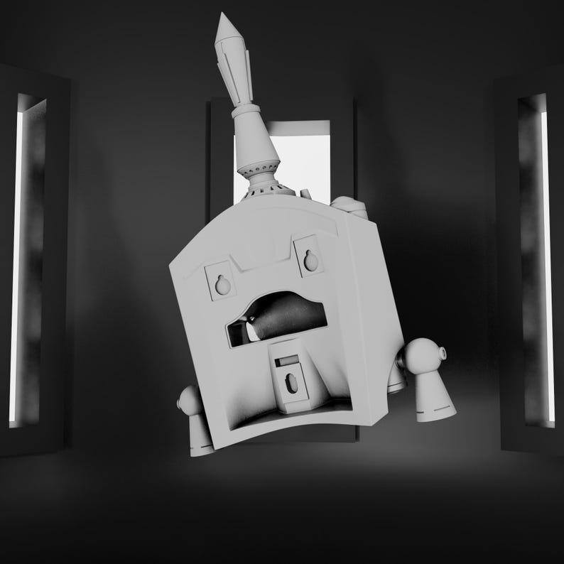 May include: A matte light gray, angular, geometric object with a central rectangular opening, a pointed vertical spire on top, and two cylindrical side attachments. The structure features recessed rectangular details and a smooth, uniform surface finish.