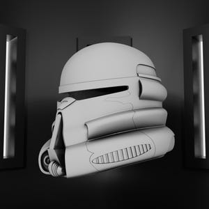 May include: A gray, detailed helmet with a rounded top and a visor. The helmet has a series of ridges and vents along the side and front. The helmet is set against a dark background with two vertical light panels on either side.
