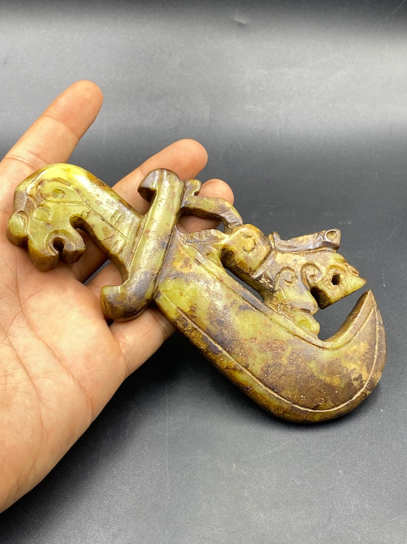 Wonderful old beautiful Tibetan machete jade with Lion standing Wonderful old beautiful Tibetan machete jade with Lion standing