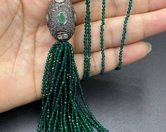 A gorgeous tassel necklace with green onyx and Victorian rose cut diamond bead