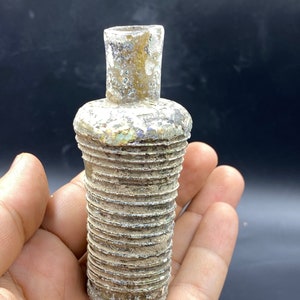 ancient very beautiful authentic Roman glass with patina unique
