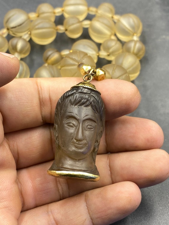 Gold necklace with face cheap engraved