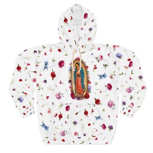 May include: White hoodie with a floral print and a picture of the Virgin Mary in the center.