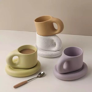 Ceramic mug with saucer