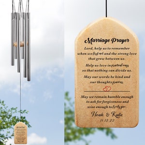 May include: A wooden wind chime with a beige plaque that reads "Marriage Prayer" with a prayer for a couple, the names Noah & Katie and the date 11.12.22.