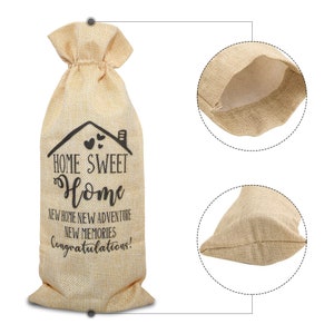 May include: A beige burlap gift bag with a black print that reads "Home Sweet Home, New Home New Adventure New Memories Congratulations!" The bag has a drawstring closure and is perfect for a housewarming gift.