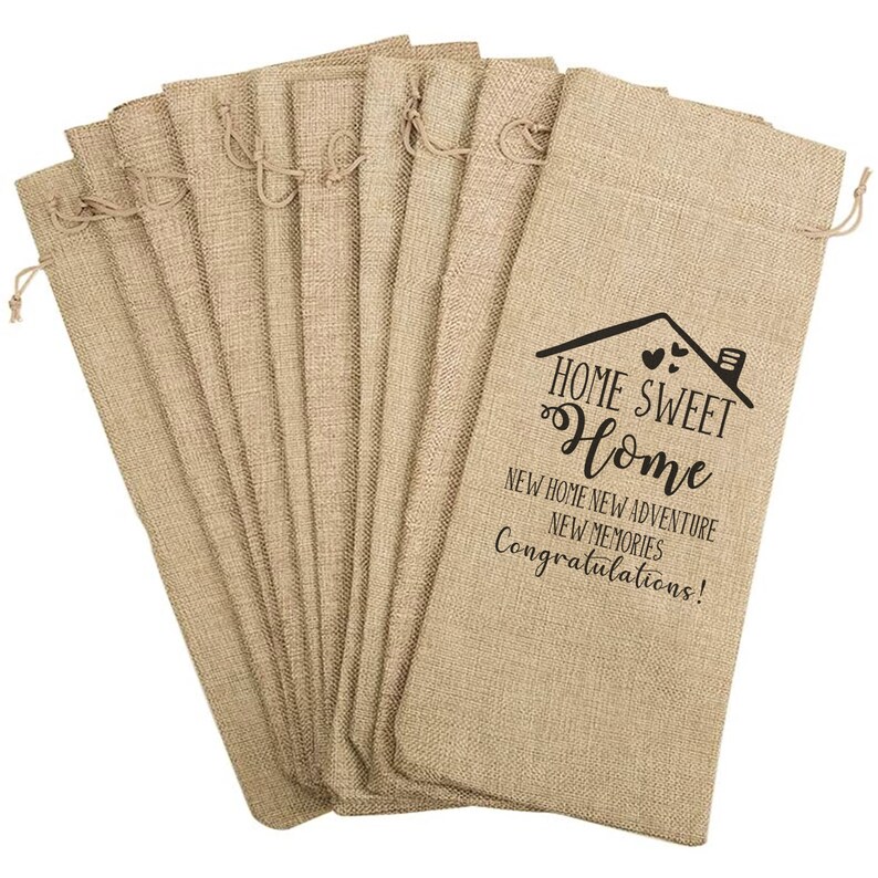 May include: A set of 10 burlap wine bags with a drawstring closure. The bags are printed with the text "Home Sweet Home" and "New Home New Adventure New Memories Congratulations!"