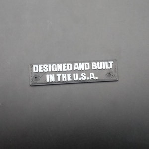 Disigned and built in the usa logo. 3d printed.