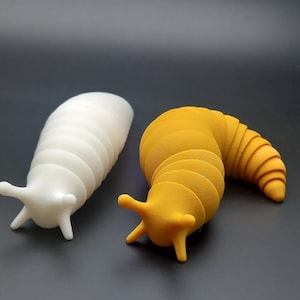 Slug Fidget Toy - Articulated Slug. Different colors and sizes.