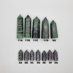 May include: A collection of 10 green and pink gemstone points, labeled 11A, 11B, 11C, 11D, 9A, 5A, 5B, 5C, 5D, 5E, 5F, and 5G.