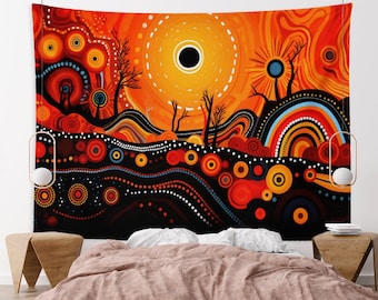 May include: A tapestry with an abstract design featuring a sunset landscape with orange, red, yellow, and black colors. The design includes circles, dots, and wavy lines.