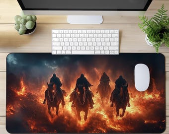 May include: A rectangular mouse pad featuring a dramatic scene of hooded figures on horseback riding through flames. The artwork is predominantly orange, red, and black, with a dark, ominous sky. A white keyboard and mouse sit above the pad.