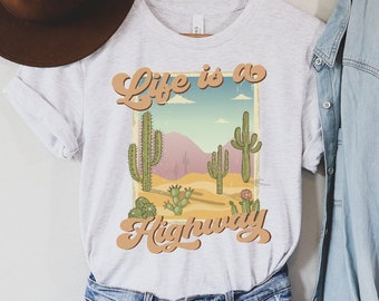 Camiseta con gráfico retro para mujer, camiseta de viaje por carretera con cactus del desierto y la vida es una autopista, camisetas para amantes de la naturaleza al aire libre, camiseta unisex de primavera y verano