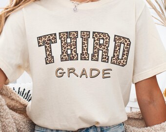 3年生用シャツ、3年生教師チームシャツ、かわいいヒョウ柄の新学期Tシャツ、3年生初日の子供用Tシャツ