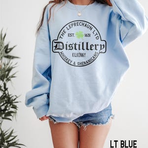 St Patrick's Day Sweatshirt or Hoodie, Irish Leprechaun Distillery Unisex Sweater Gifts for Him or Her Light Blue