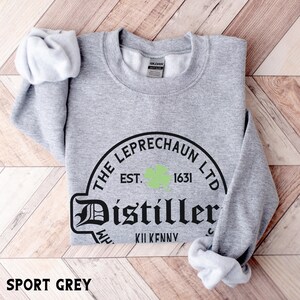 St Patrick's Day Sweatshirt or Hoodie, Irish Leprechaun Distillery Unisex Sweater Gifts for Him or Her Sport Grey