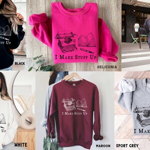 Puede incluir: Una colecci&oacute;n de sudaderas y sudaderas con capucha en varios colores, incluyendo negro, blanco, granate y gris. Cada prenda presenta un gr&aacute;fico de una m&aacute;quina de escribir, un libro y un bol&iacute;grafo, con el texto "I Make Stuff Up".