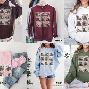 May include: A collage of nine images of Highland cows printed on a variety of sweatshirts. The sweatshirts are available in dark chocolate, maroon, white, light pink, light blue, and military green.