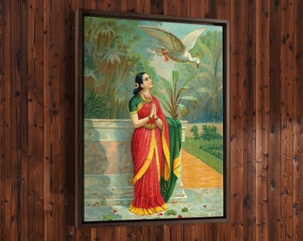 Puede incluir: Una pintura de una mujer con un sari rojo y verde de pie en un jardín. Está mirando hacia arriba a un pájaro blanco que vuela por encima. La pintura está enmarcada en un marco de madera oscura.