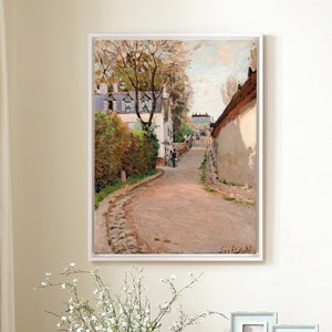 May include: A painting depicting a street scene in a European village. The street is lined with buildings and trees, and people can be seen walking along it. The painting is executed in a realistic style and conveys a warm, welcoming atmosphere.