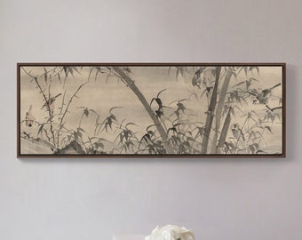 May include: A black framed print of a traditional Japanese painting depicting birds in a bamboo forest. The print is hanging on a light grey wall above a dark grey dining table with white chairs.