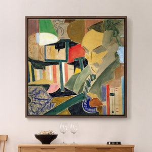 May include: Abstract painting in a dark wooden frame. The artwork features a cubist style with geometric shapes and a muted color palette of green, yellow, red, and blue. The painting is displayed above a wooden dresser.