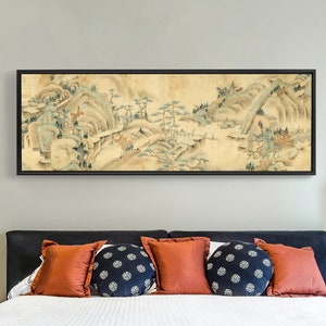 May include: A framed painting of a traditional Chinese landscape scene with mountains, trees, and water. The painting is done in a light brown and green color palette and has a vintage feel.