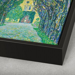 May include: A framed painting of a pathway lined with trees leading to a yellow building. The trees are painted in a pointillist style with blue, green, and yellow hues. The pathway is a light blue and green color.