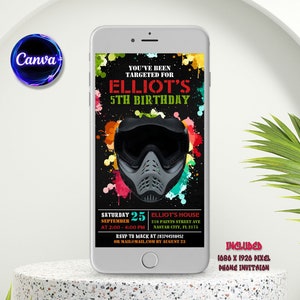May include: A smartphone displaying a digital invitation for a 5th birthday party. The design includes a paintball mask, vibrant paint splatters, and event details. The invitation text reads "YOU'VE BEEN TARGETED FOR" and "INCLUDED 1080 X 1920 PIXEL PHONE INVITATION."
