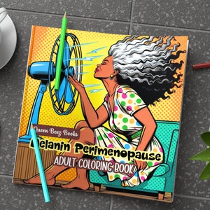 May include: An adult coloring book cover featuring a woman with gray hair sitting on a couch with a fan blowing on her. The cover is yellow with a comic book style design. The title of the book is "Melanin Perimenopause Adult Coloring Book" by Queen Beez Books.