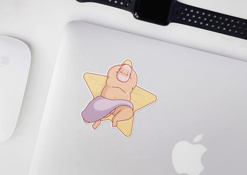 May include: A cartoon illustration of a person laying on a yellow star-shaped beach towel. The person is wearing a purple and pink towel wrapped around their waist.