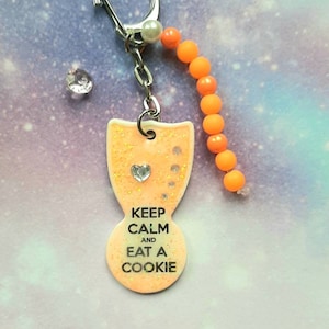 Einkaufswagenlöser mit Keep Calm Spruch und Strassherz in neon Orange, zum Einkaufen sehr praktisch, als Geschenk oder für Sie