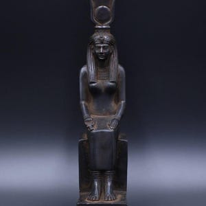 Pretty Hathor statue ancient Egyptian goddess of the sky,love,beauty,happiness,fertility in ancient Egyptian mythology.sculpture diety figur