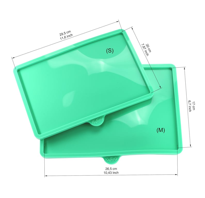 May include: Two green silicone baking mats, one labeled "S" and measuring 11.6 inches by 7.87 inches, and the other labeled "M" and measuring 10.43 inches by 6.7 inches.