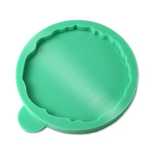 Può includere: Stampo in silicone verde con bordo a festoni, progettato per creare oggetti rotondi in resina.