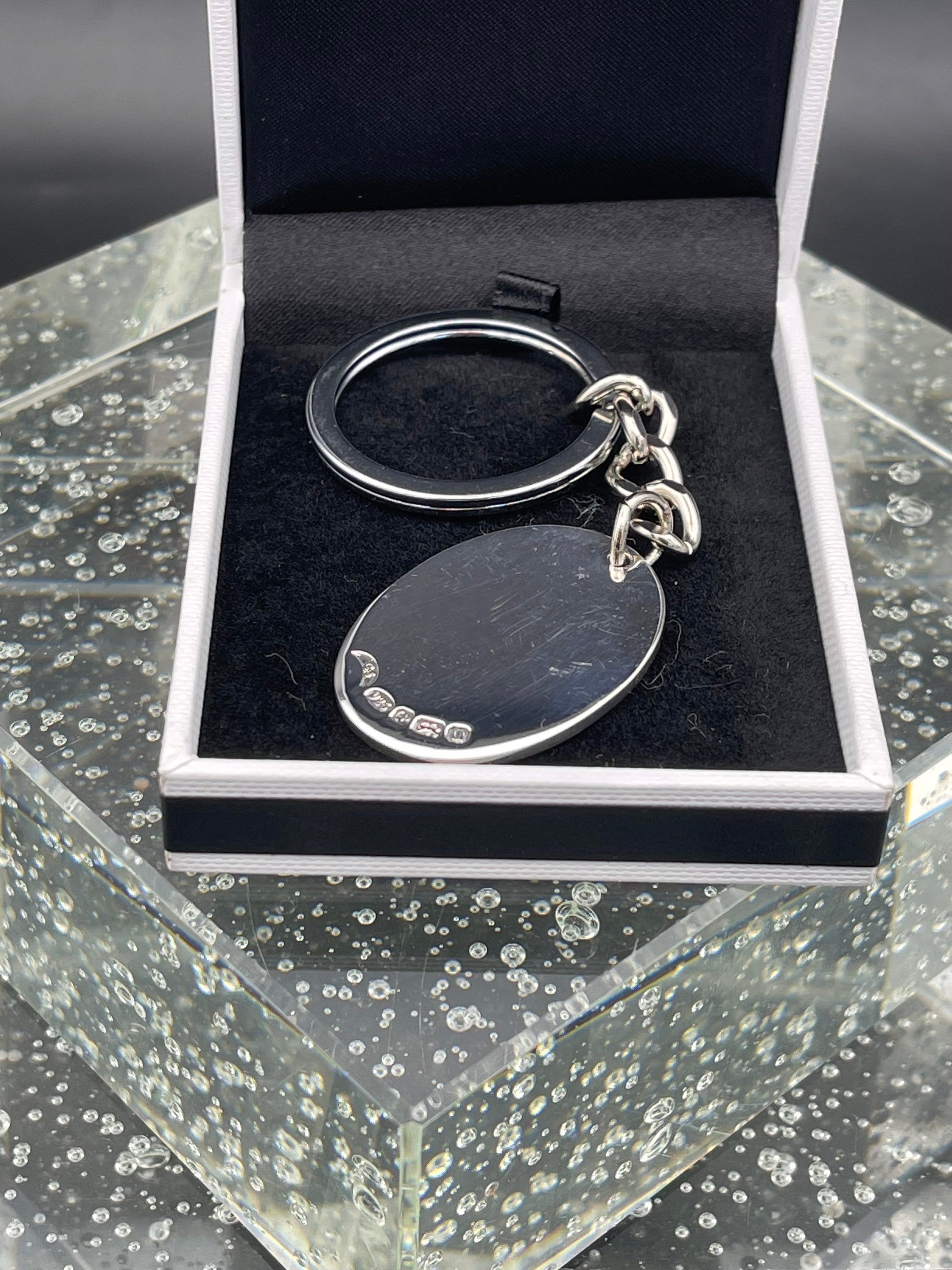 Silver key store ring design