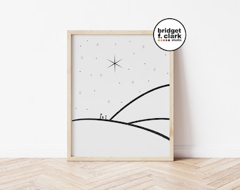 Könnte beinhalten: Schwarz-weiß minimalistischer Kunstdruck eines Sterns und drei Figuren, die auf einem Hügel stehen. Der Druck ist in einem hellen Holzrahmen gerahmt.