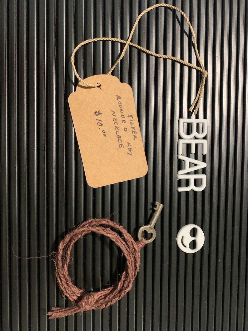 Silver Rounded Key Necklace