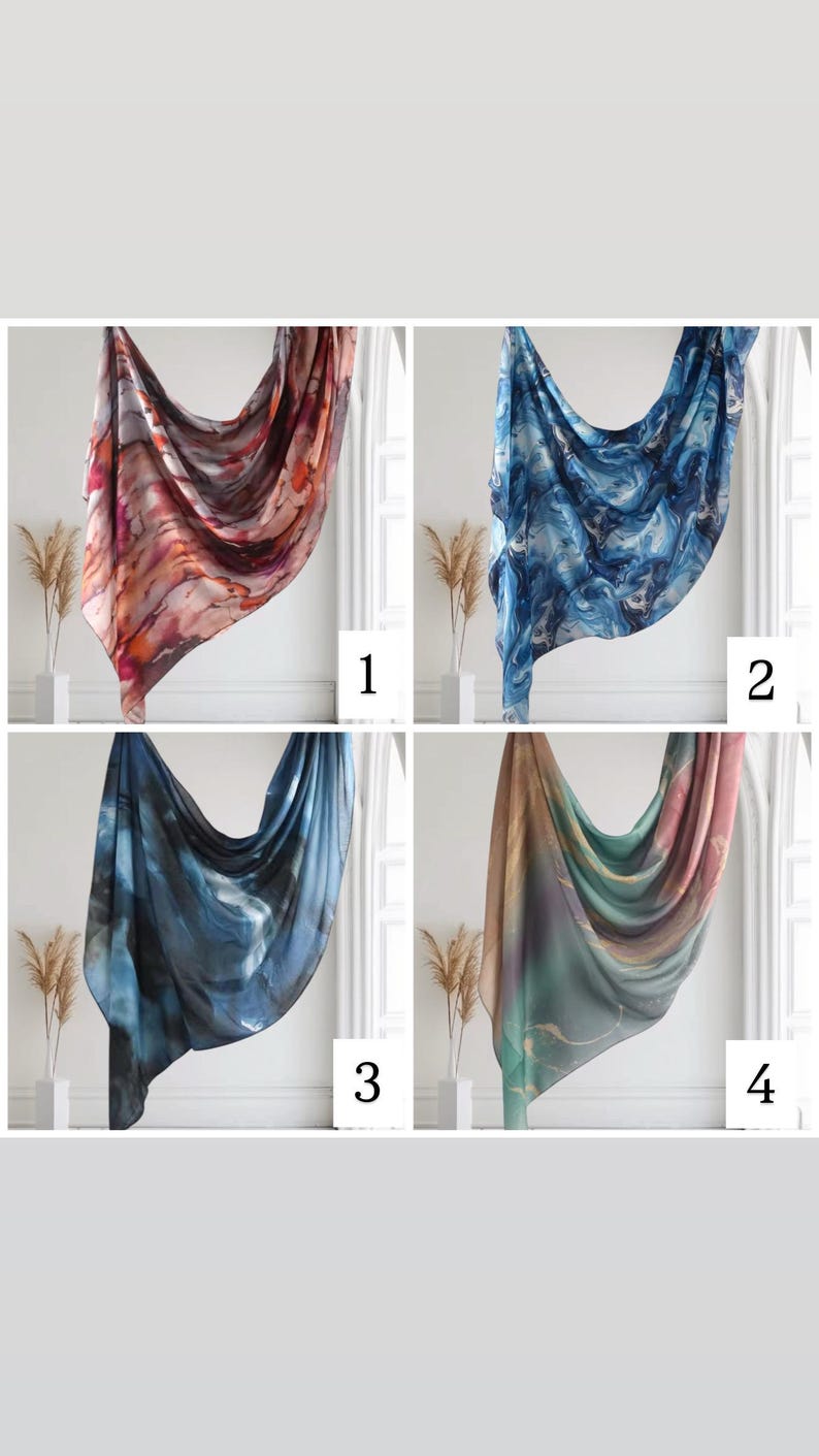 May include: Four different patterned scarves, each displayed on a white wall with a plant in the corner. The scarves are in shades of blue, orange, pink, and green.