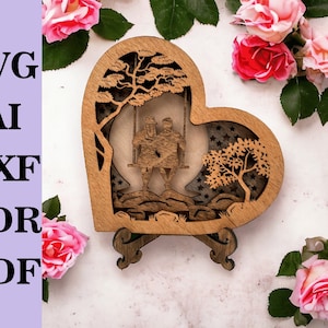 Herz aus Holz Laser Cut Vorlage mit Liebespaar auf Schaukel am Fluss - Laser Schnitt Digitale Datei, svg ai dxf pdf cdr