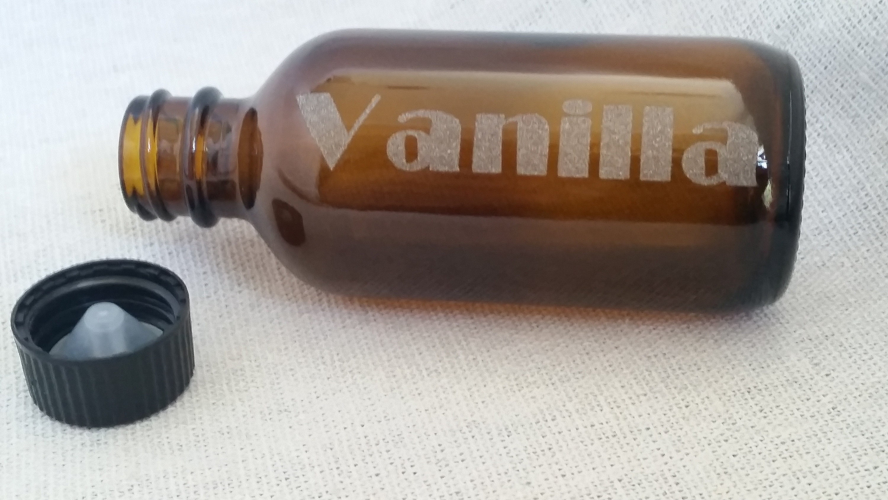 Vanilla Bottle 2oz Broadway Font