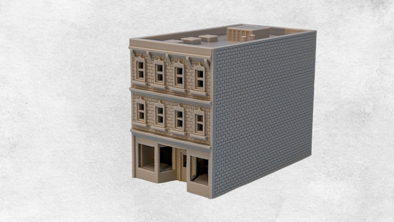 a building made out of legos on a white background